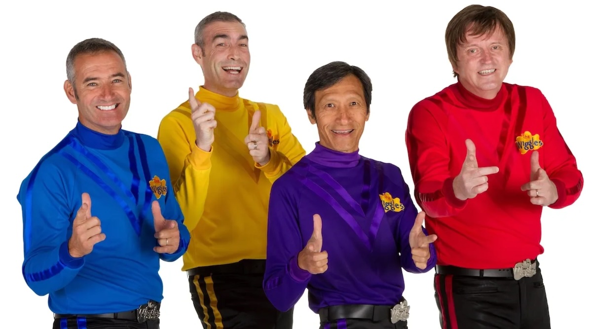 The Wiggles, a group of four children's musicians in brightly coloured solid shirts