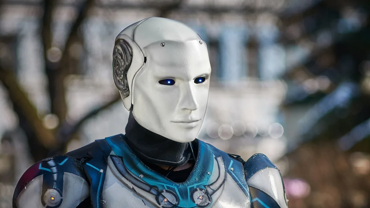 A humanoid robot with illuminated eyes representing synthetic media and artificial intelligence